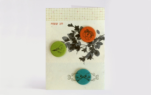 buttons covered with colored fabrics and illustrations
