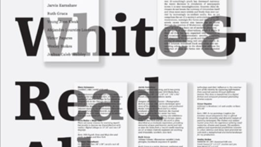 An image of different text articles and over them a transparent text that says: Black and White and Read All Over.