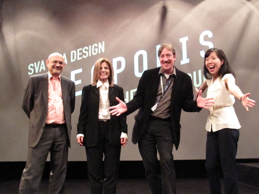 group photo of two women and two men on the stage of the Ideopolis exhibition