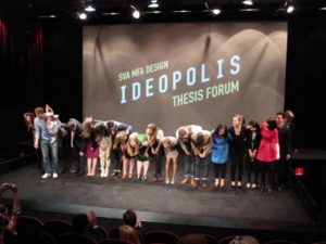 students bowing on the stage at the end of the Ideopolis presentation