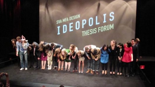 students bowing on the stage at the end of the Ideopolis presentation