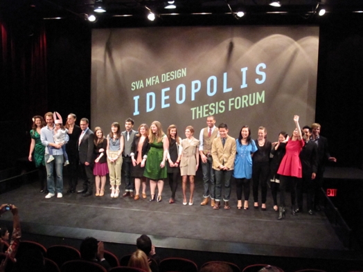 group photo of people on the stage at the ideopolis exhibition event