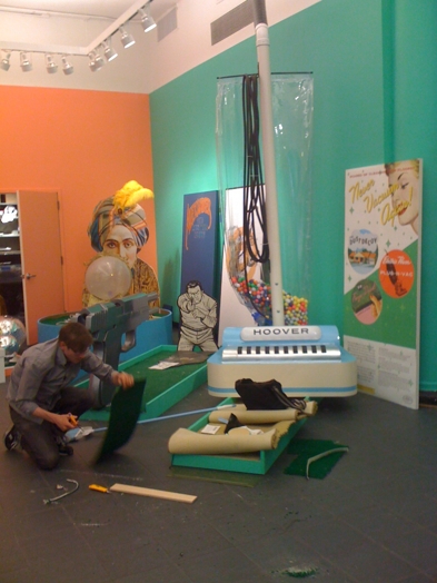 a person working on the installation of mini-golf courses