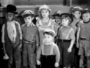 still from an old movie in black and white with a group of children