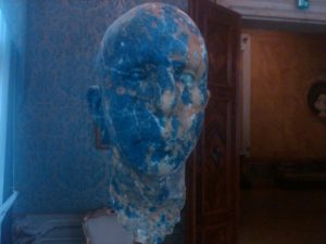 blue face sculpture