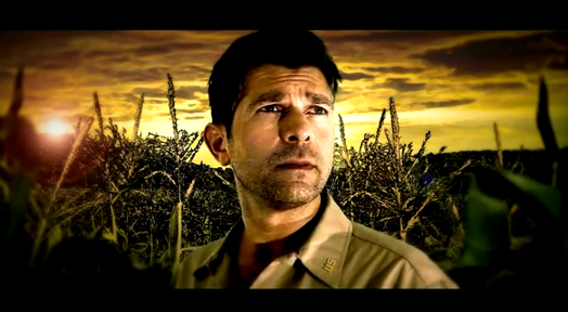 surreal portrait of a man in a corn field