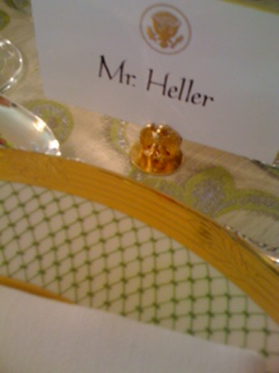 Mr. Heller's card on the table for him to recognize his seat at the table