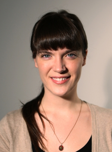 portrait of a woman with her hair styled in a ponytail