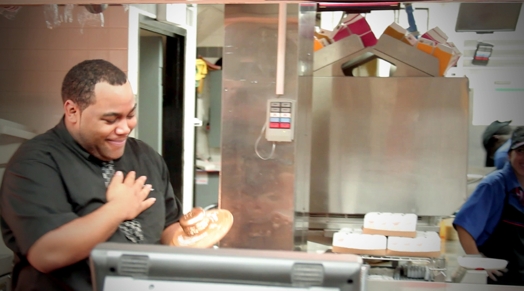 image of a man near the kitchen of a restaurant