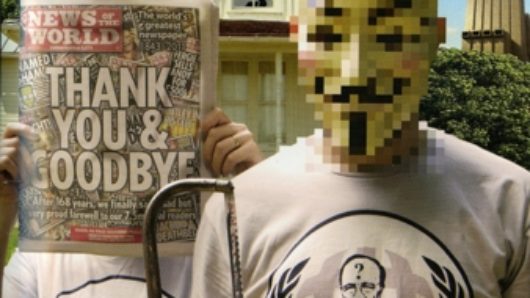 a magazine cover with a person wearing an anonymous mask and another person covering their face with a magazine cover with the message thank you and goodby