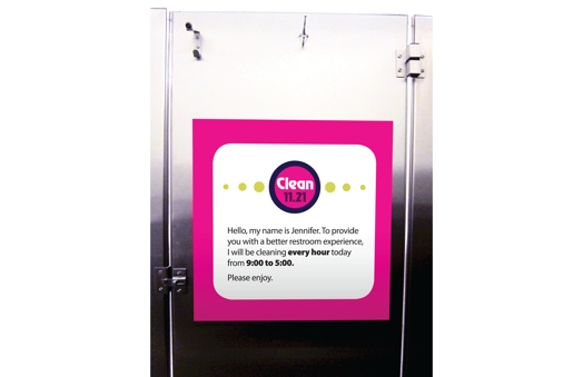the clean sticker with pink outline installed on a metal door