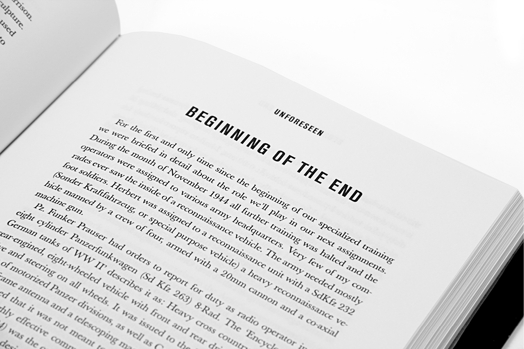 close-up of a page from an opened book with the title "beginning of the end"