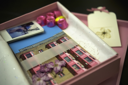 pink box with photos