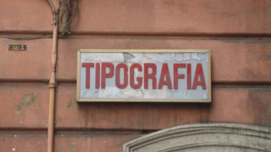 typography sign on wall