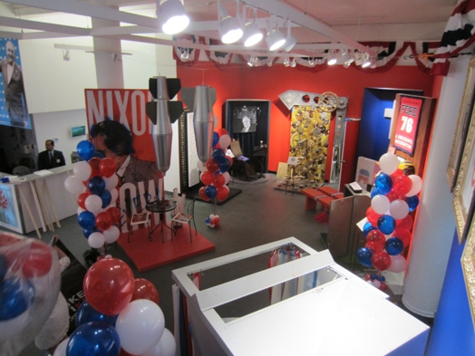 Election exhibition with balloons, flags and miscellaneous objects