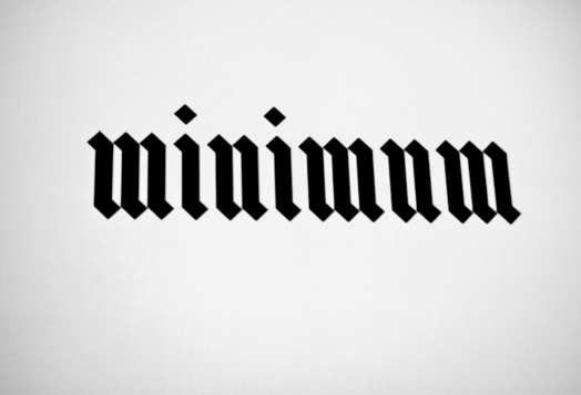 word minimum printed on paper