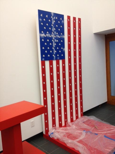 USA flag near a wall