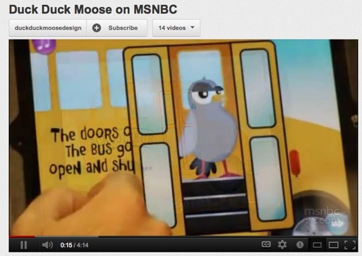 A still shot from Duck Duck Moose on MSNBC, depicting a yellow school bus with a bird at the door. On the bus the text says: The doors of the bus go open and shut.