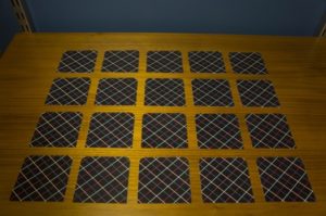 A photo of a set of tiles put in a table pattern.