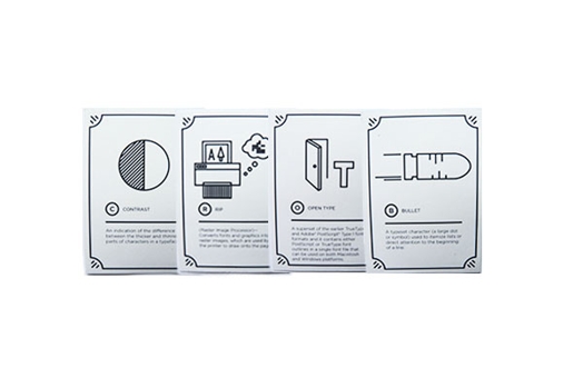 A set of four Flashtype game cards, each having a unique drawing and text on it.