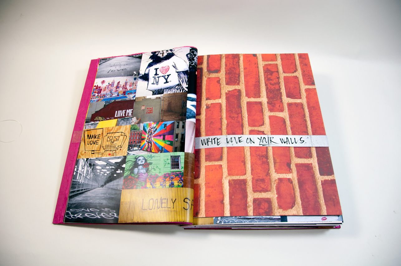 an opened book depicting a collage of random images on the left and a brick wall on the right
