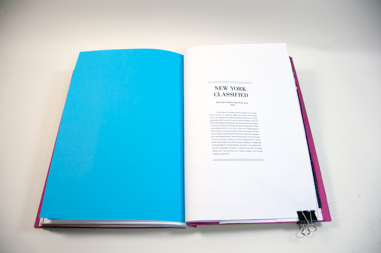 an opened book with a blue page on the left side and a small paragraph and a heading on the right side