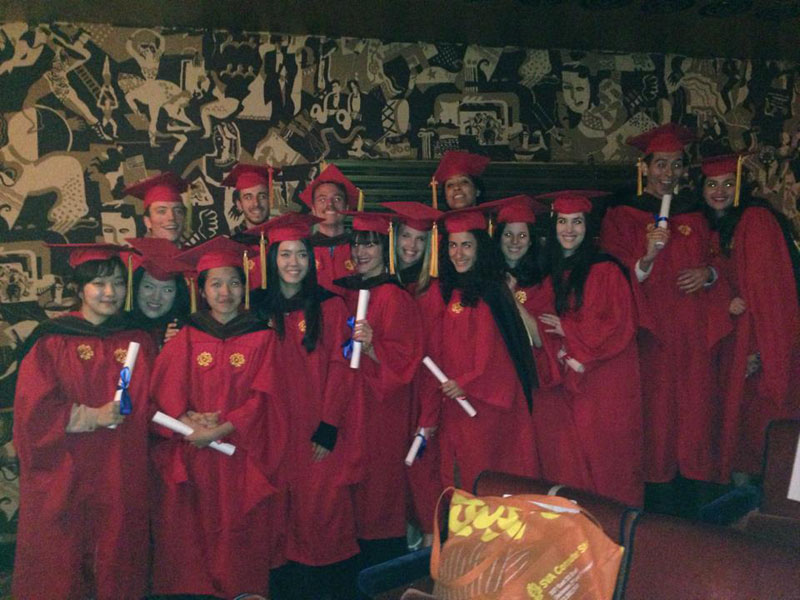 students in the red robe at the graduation