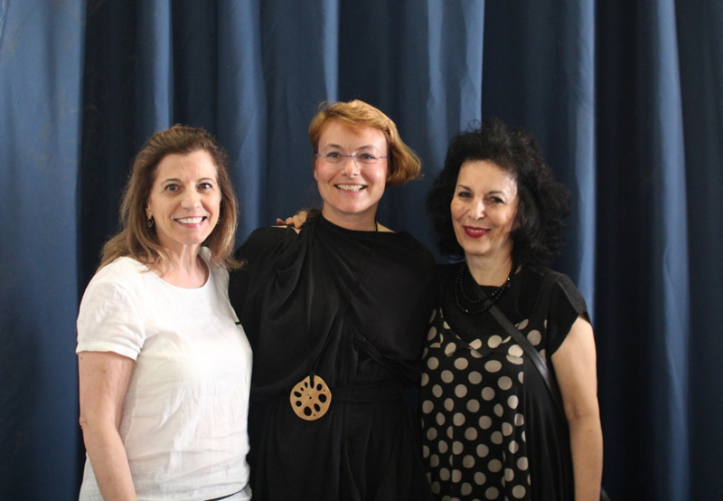three woman posing together