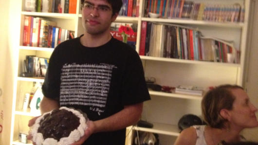 student holding a pie