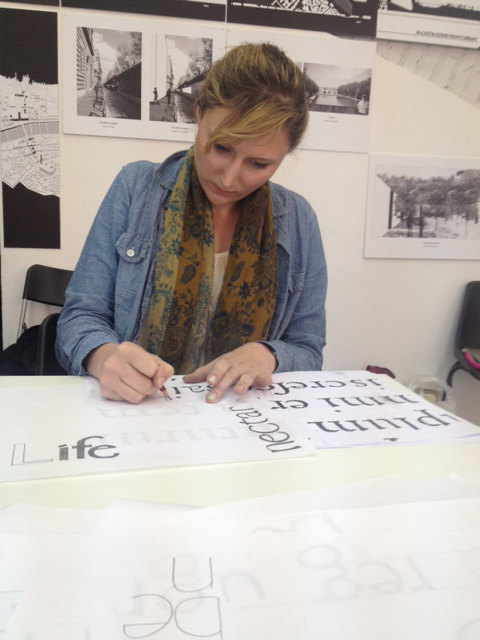 student working on making typeface
