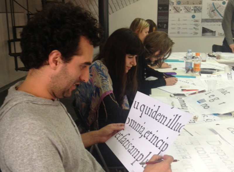 students working on typeface