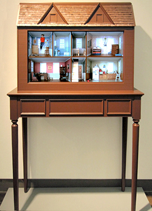 a table with a house model