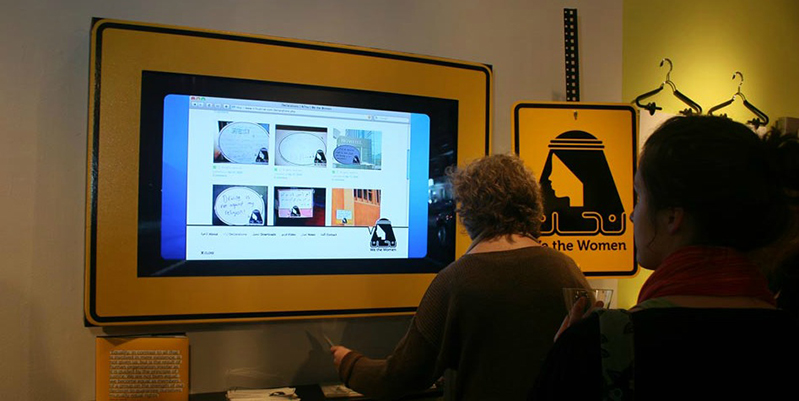 a presentation of a website in an exhibition gallery