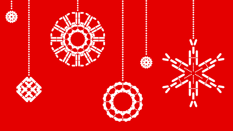 white circles and snowflakes shapes as Christmas tree decorations on a red background