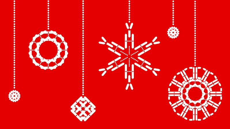 white circles and snowflakes shapes as Christmas tree decorations on a red background