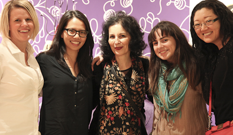 a group photograph of five women