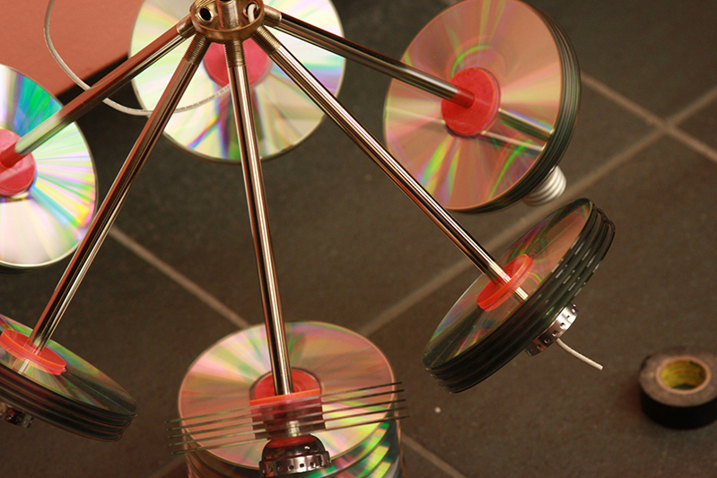 CD on a metal rods