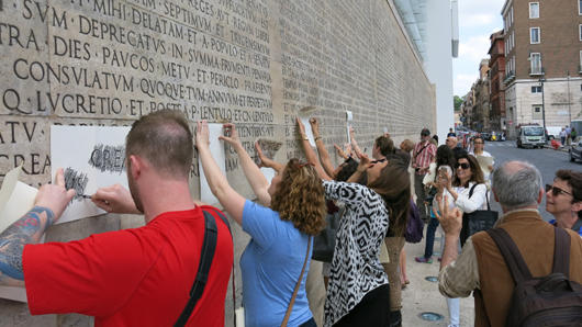 people making frottage on wall