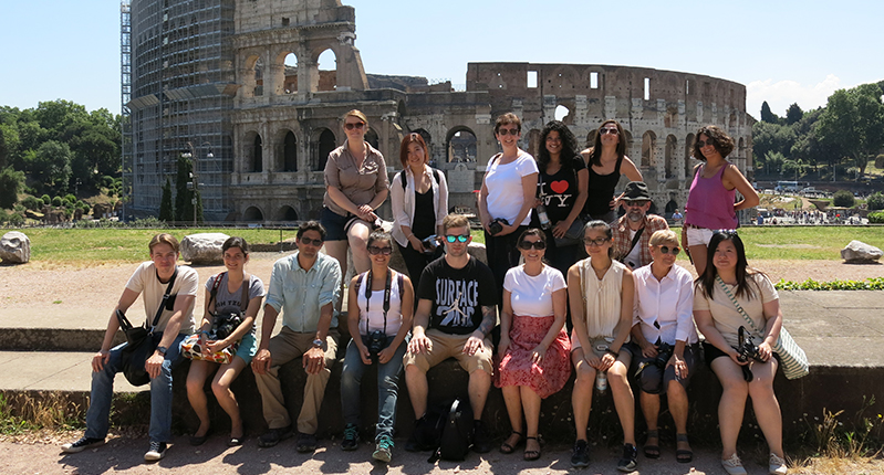 group photo in front of the colosseum
