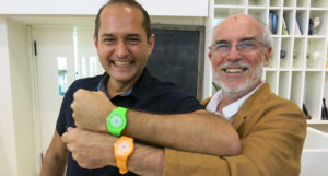 two men with neon watches