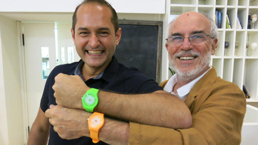 two men with neon watches