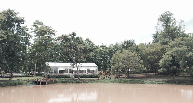 photo of a lake with am architecture building