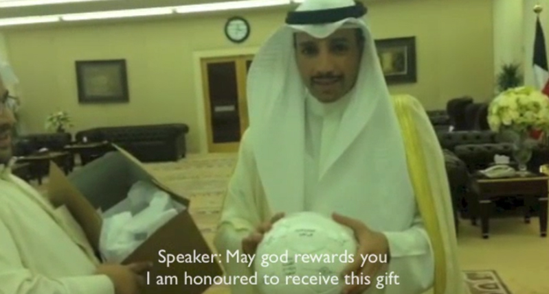 Arabic man receiving a gift