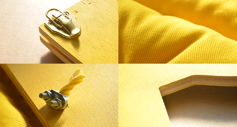 yellow details and on fabric ad wood