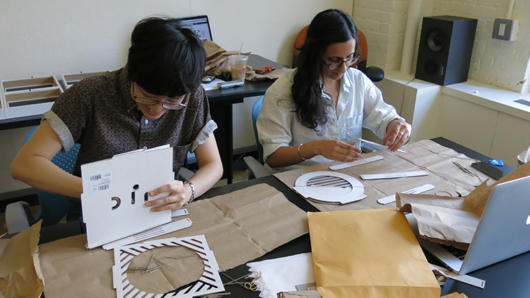 man and woman working at table