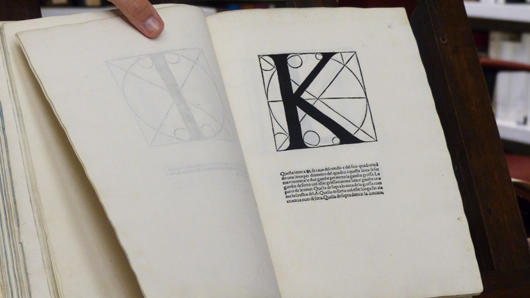 old book with alphabet K