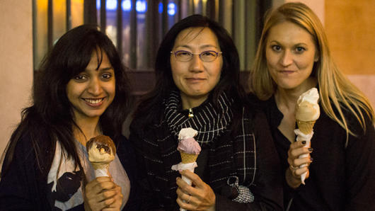 three women holding ice cream