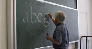 Lecturer lettering on a chalkboard