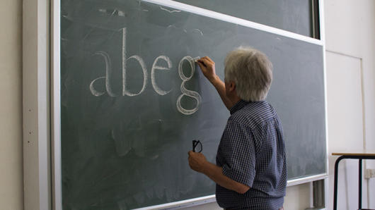 Lecturer lettering on a chalkboard