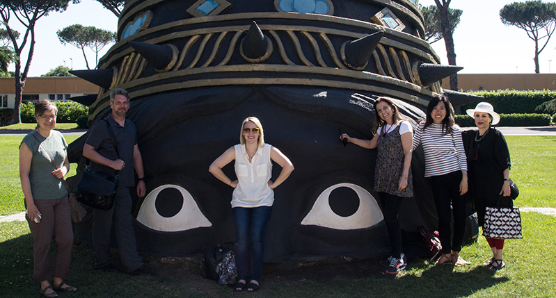 Group photo with the black head sculpture